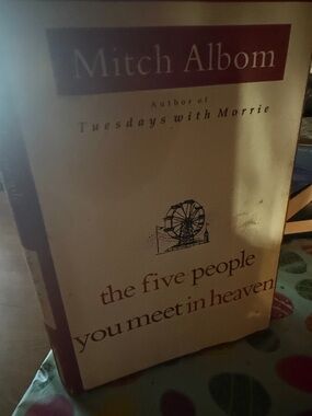 The Five People You Meet in Heaven - Cream and Maroon Book Cover